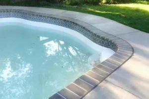 Image of a residential concrete swimming pool